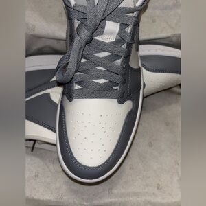 Gray and White Jordan 1s Mid